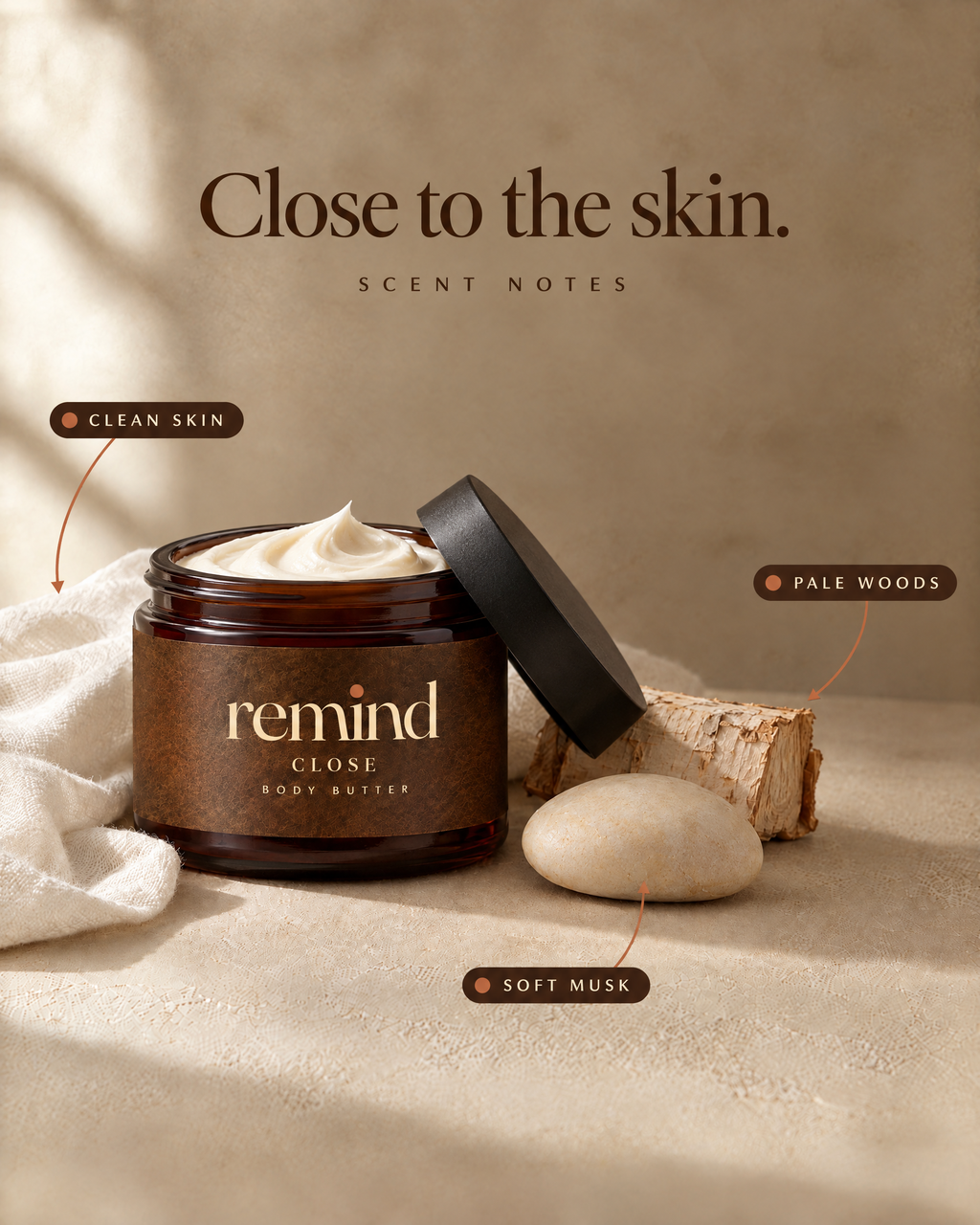 Open jar of CLOSE body butter with its scent notes: clean skin, soft musk and pale woods