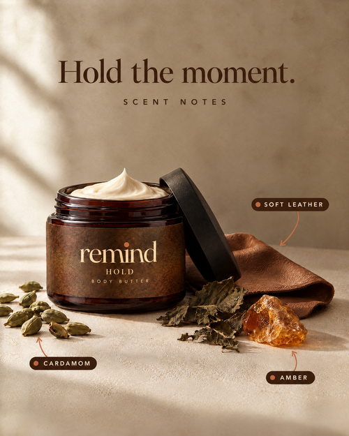 Open jar of HOLD body butter with its scent notes: cardamom, soft leather, patchouli and amber