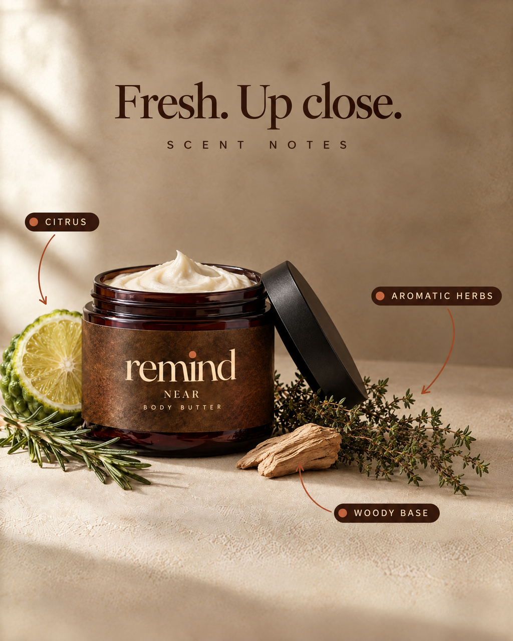 Open jar of NEAR body butter with its scent notes: citrus, aromatic herbs and a woody base